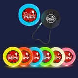 Set of colorful 'Flash Puck' light-up pucks in various colours